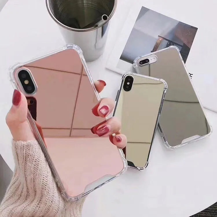 Mirror Phone Case in TPU material for iPhone protection, shown in multiple colours including black, blue, gold, rose gold, silver, and transparent.