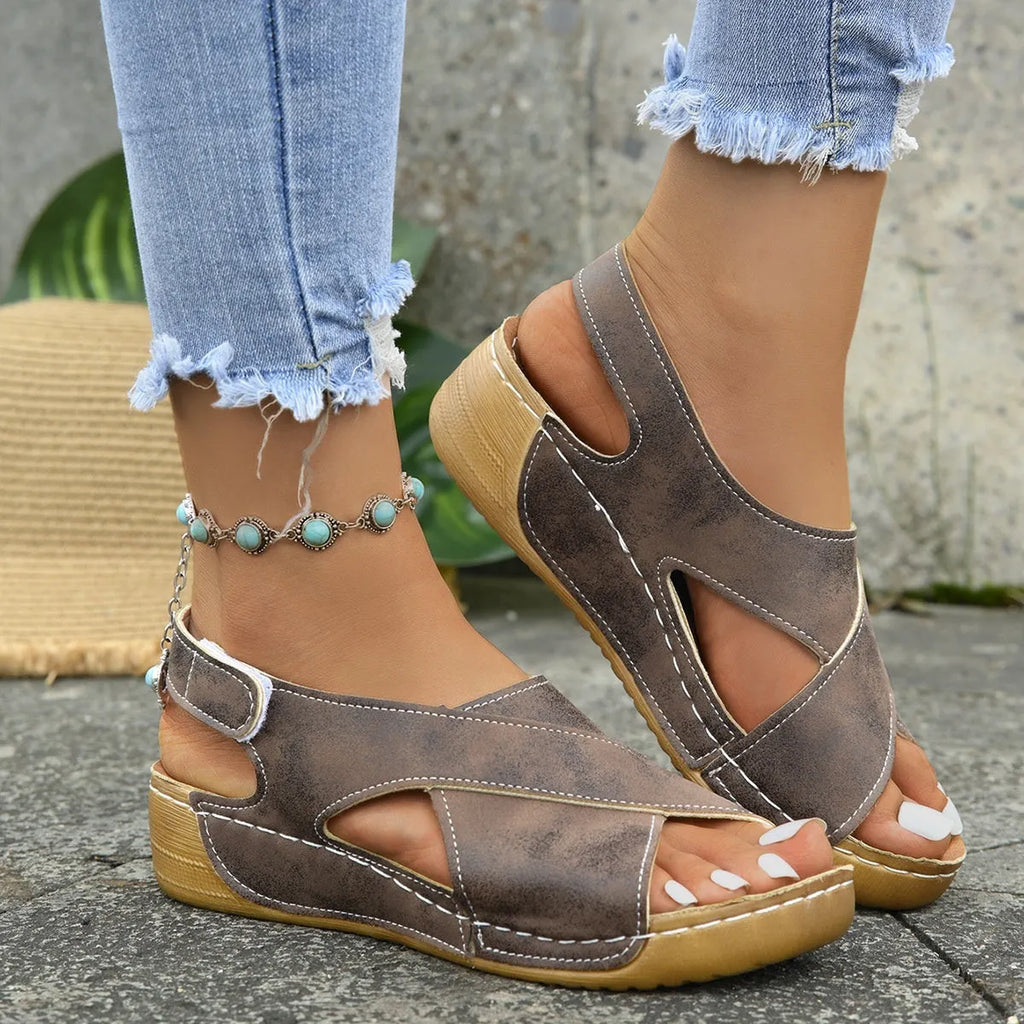 Women's brown Roman platform sandals with an ankle skirt and Velcro strap