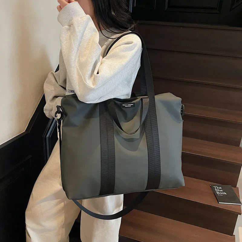 Lightweight Oxford cloth tote bag with 20-35 litre capacity in black colour option