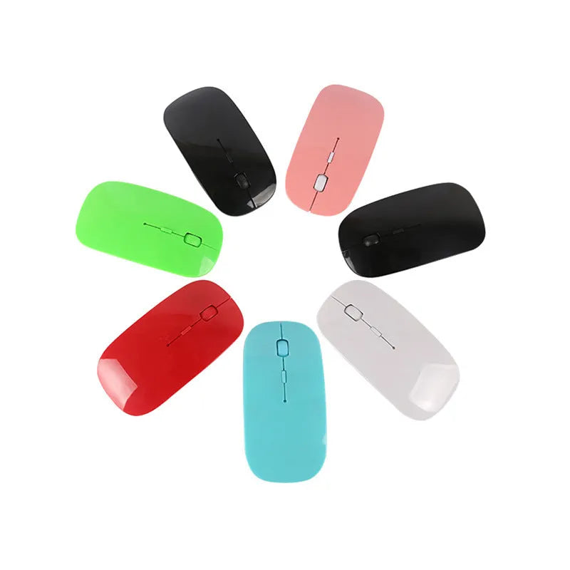 Wireless USB computer mouse shown in multiple colour options: black, blue, green, pink, red, and white.