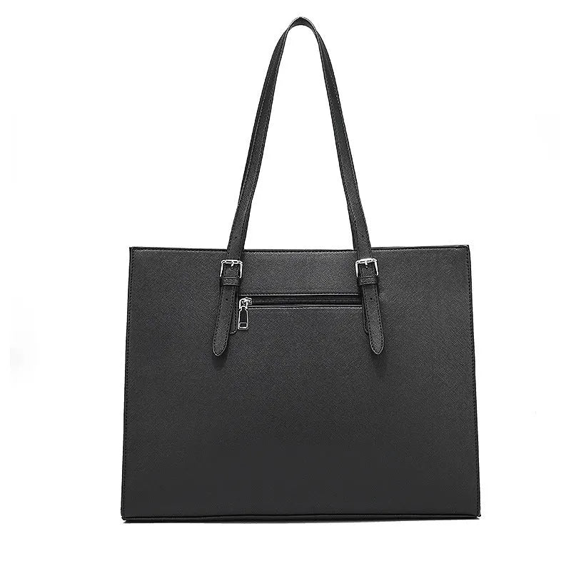 Black women's structured business computer bag showing front sandwich pocket and three adjustable shoulder straps.