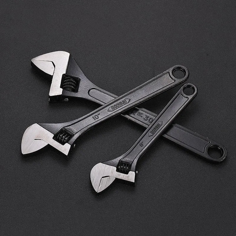 Stainless steel adjustable wrench with blackening treatment, ergonomic handle, and adjustable jaw for bolts up to 49mm