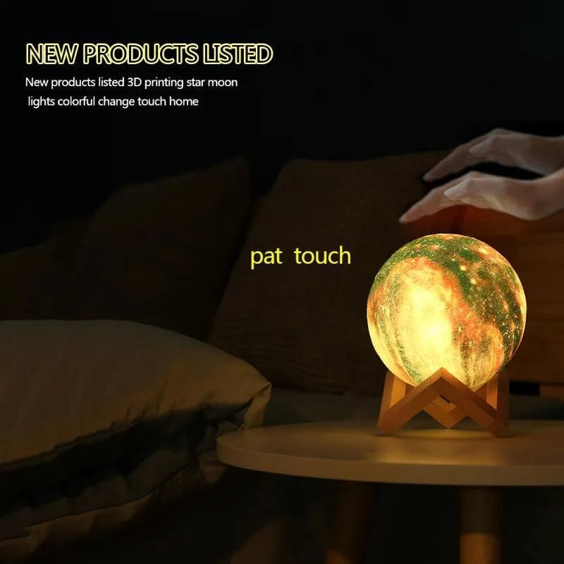 3D-printed lunar night light with LED colours, remote control, and touch sensor on wooden table