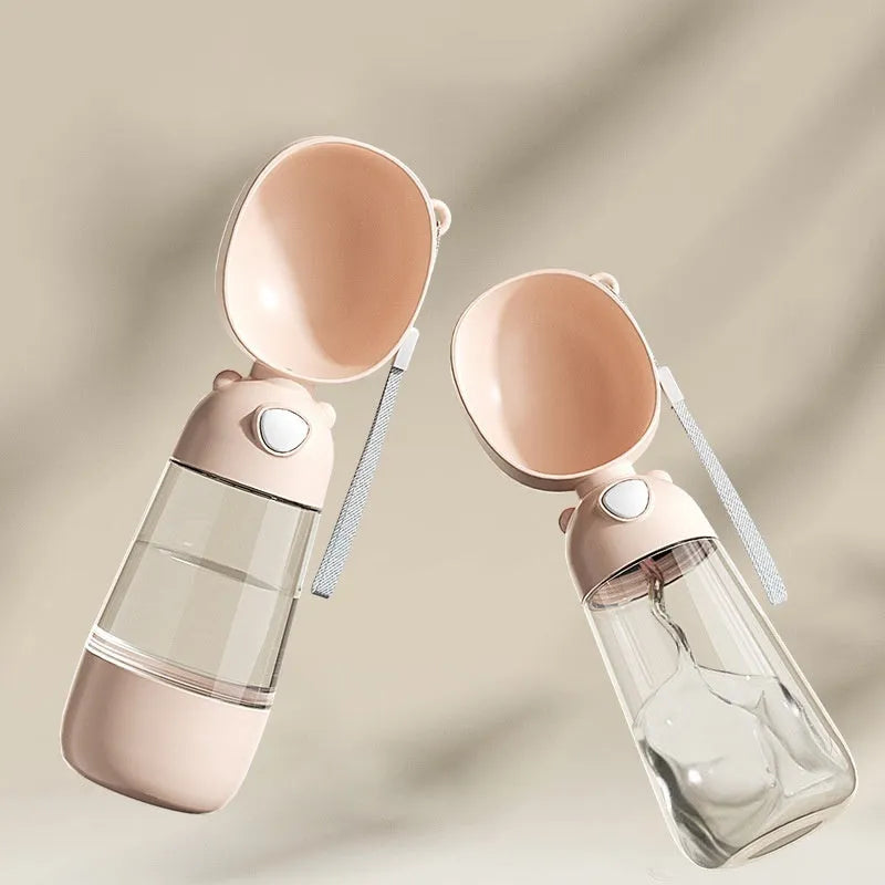 Portable dog water bottle with integrated bowl in brown, pink, and yellow colour options