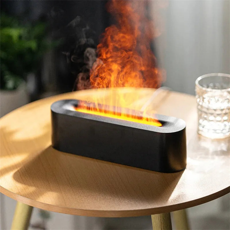 White square DQ709 flame effect aroma diffuser and ultrasonic cool mist humidifier on a table.