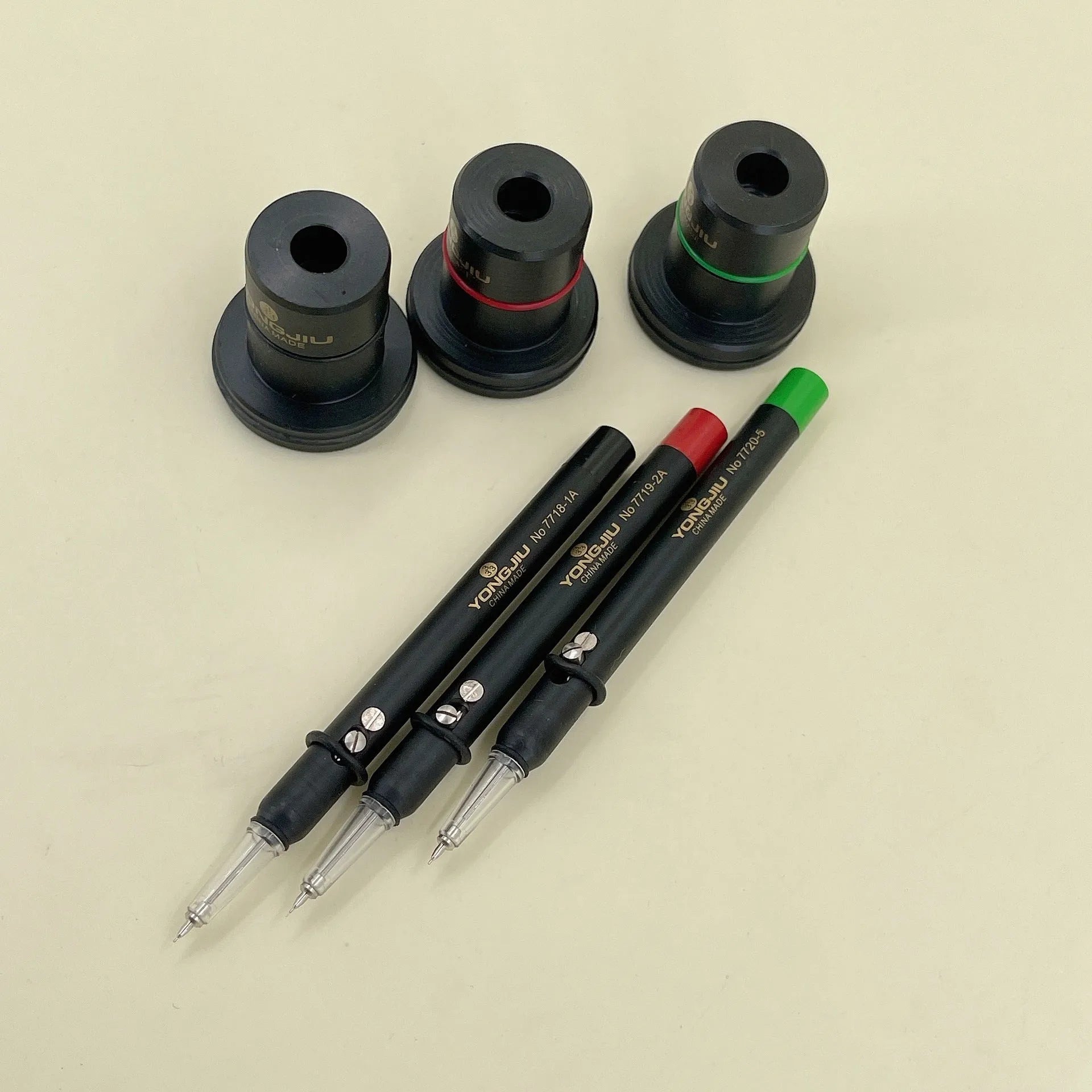 A professional watch repair oiling pen for precise lubrication, showing model options 7718, 7719, and 7720.