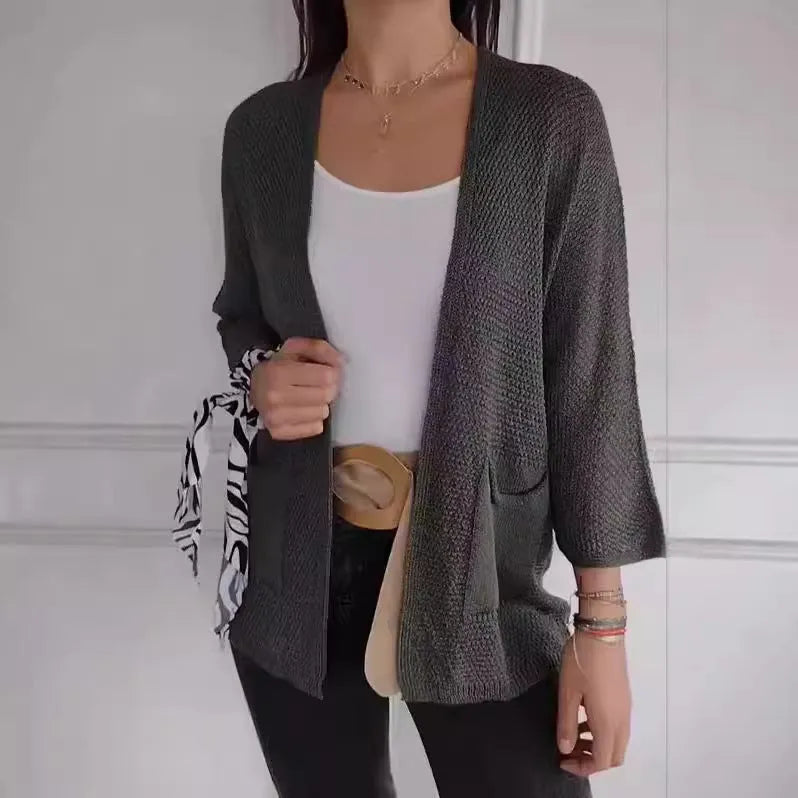 Women's waffle texture cardigan coat in army green with pocket detailing and regular sleeves