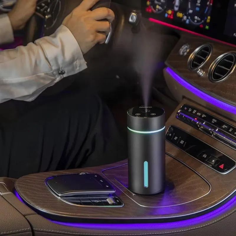 Black portable car air humidifier with aluminium tank, 66x66x144mm size, and USB cable for essential oil diffusion