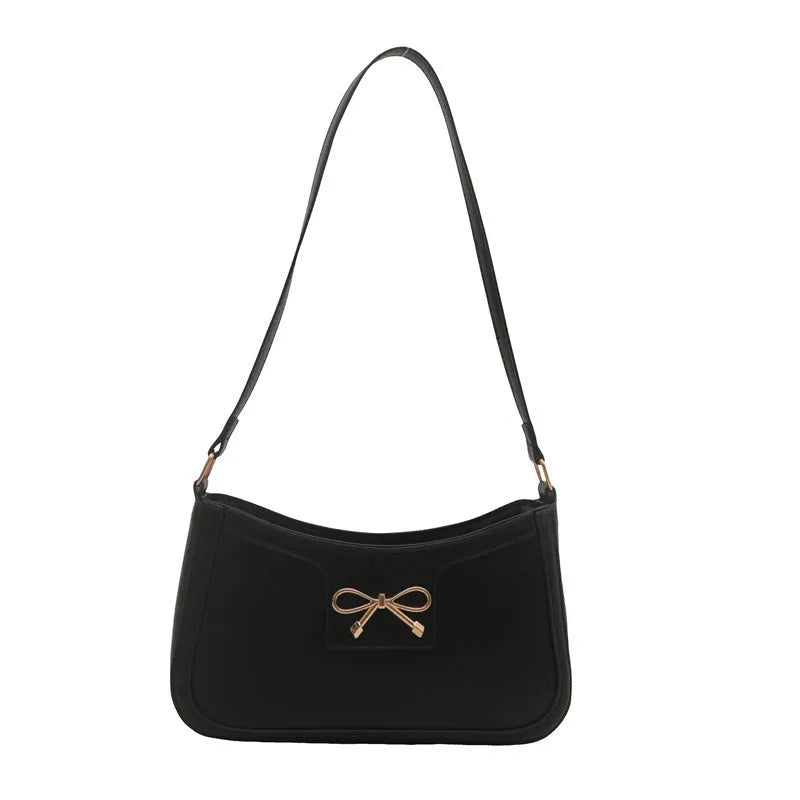 Horizontal square PU leather shoulder bag with a bow decoration, shown in multiple colours.