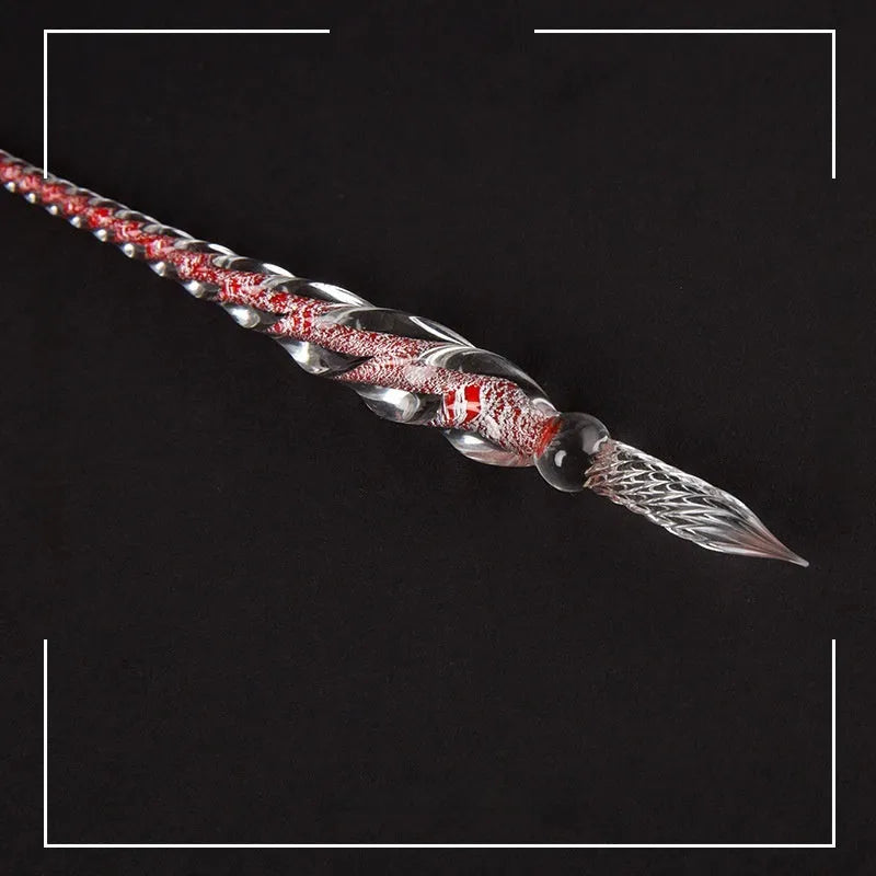 Transparent glass crystal pen with coloured ink visible inside, 0.5mm fine tip, simple modern design