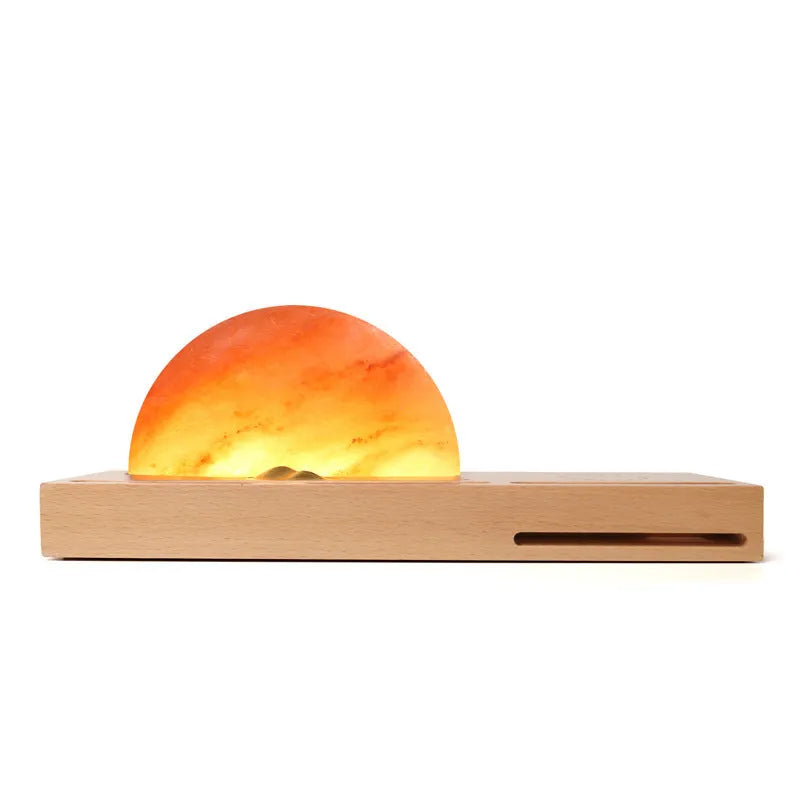 Wireless charging salt lamp with natural crystal salt shade on a solid beech wood base.