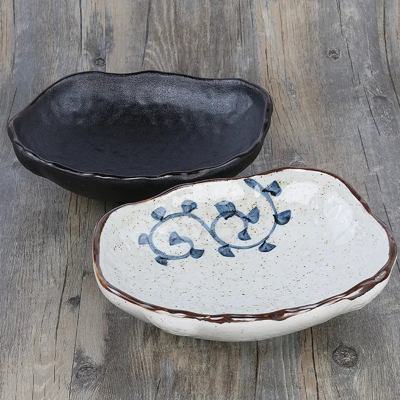 Irregular shaped coarse pottery sashimi bowl with floral decorations, measuring 24cm length, from Chaozhou porcelain
