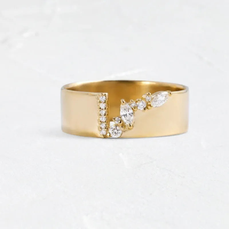 Women's gold electroplated copper ring with zircon stone, showing side and top views