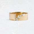 Women's gold electroplated copper ring with zircon stone, showing side and top views