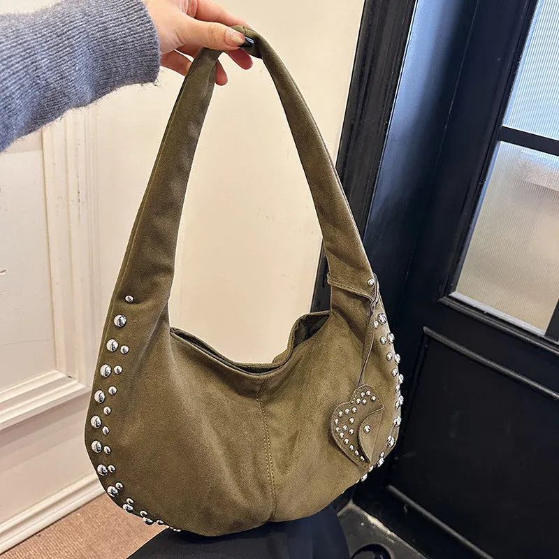 Soft plush retro style women's tote handbag held underarm in black, red, brown, green, and coffee colour options.