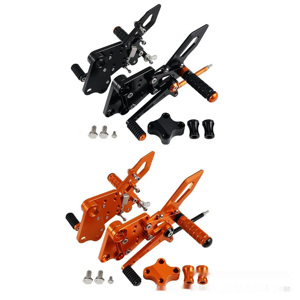 KTM Duke motorcycle rear shift pedal support assembly kit in black and orange.