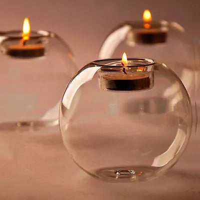 Handmade round hollow glass candle with spherical design, 7.5-10.0cm diameter range, clear transparent glass
