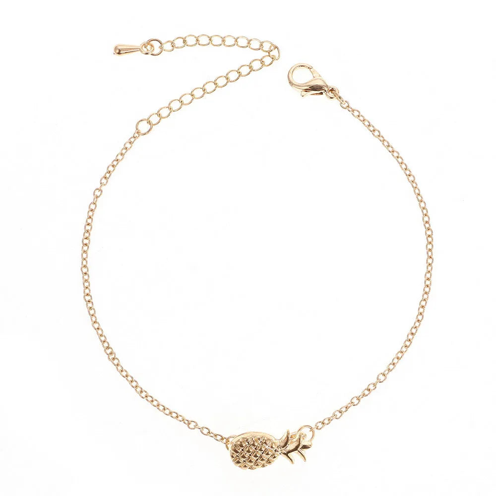 Adjustable women's pineapple bracelet with alloy fruit charm in gold or silver finish, showing clasp and chain details
