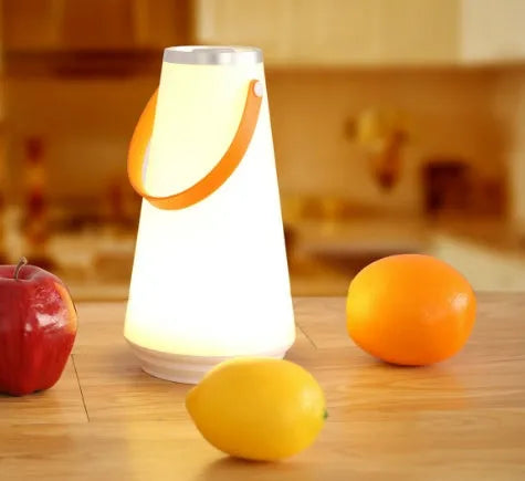 White rechargeable LED bedside table lamp with a compact ABS plastic body and soft warm white glow.