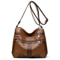 Woven PU messenger bag with horizontal square shape showing multiple compartments and internal zipper change pocket
