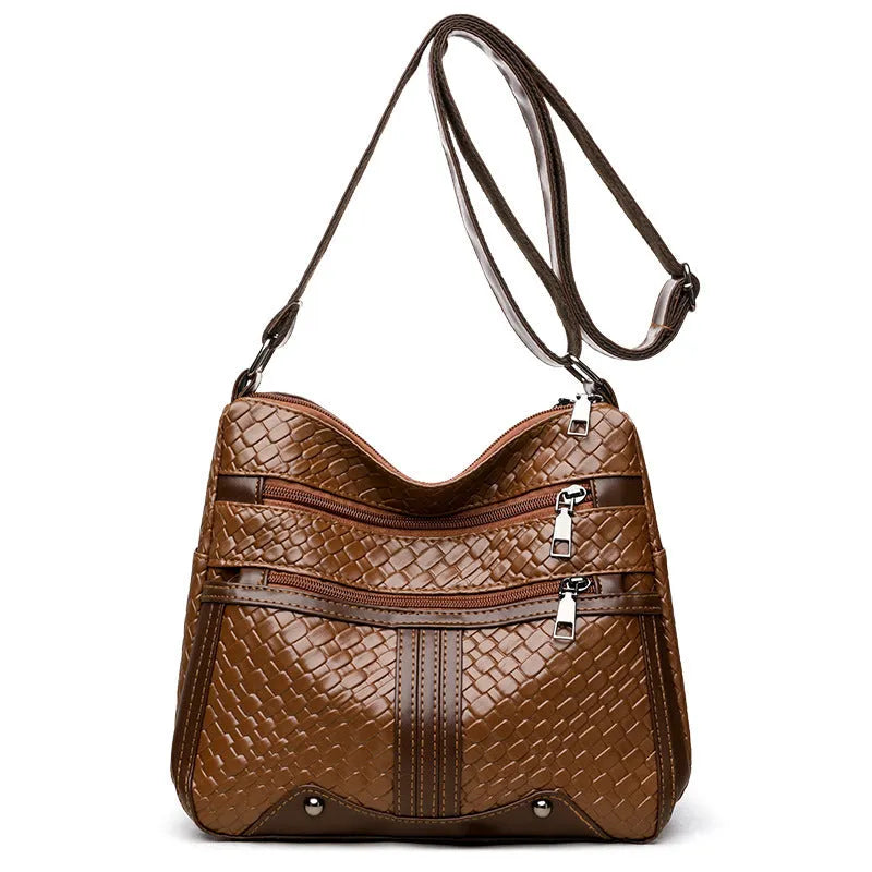 Woven PU messenger bag with horizontal square shape showing multiple compartments and internal zipper change pocket