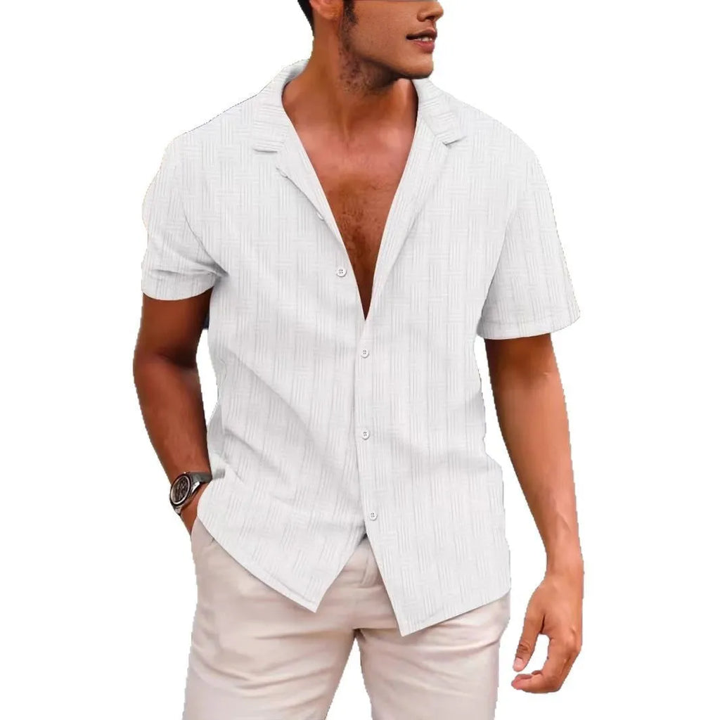 A corduroy short sleeve button shirt in a solid colour, shown in a British style cardigan fit.