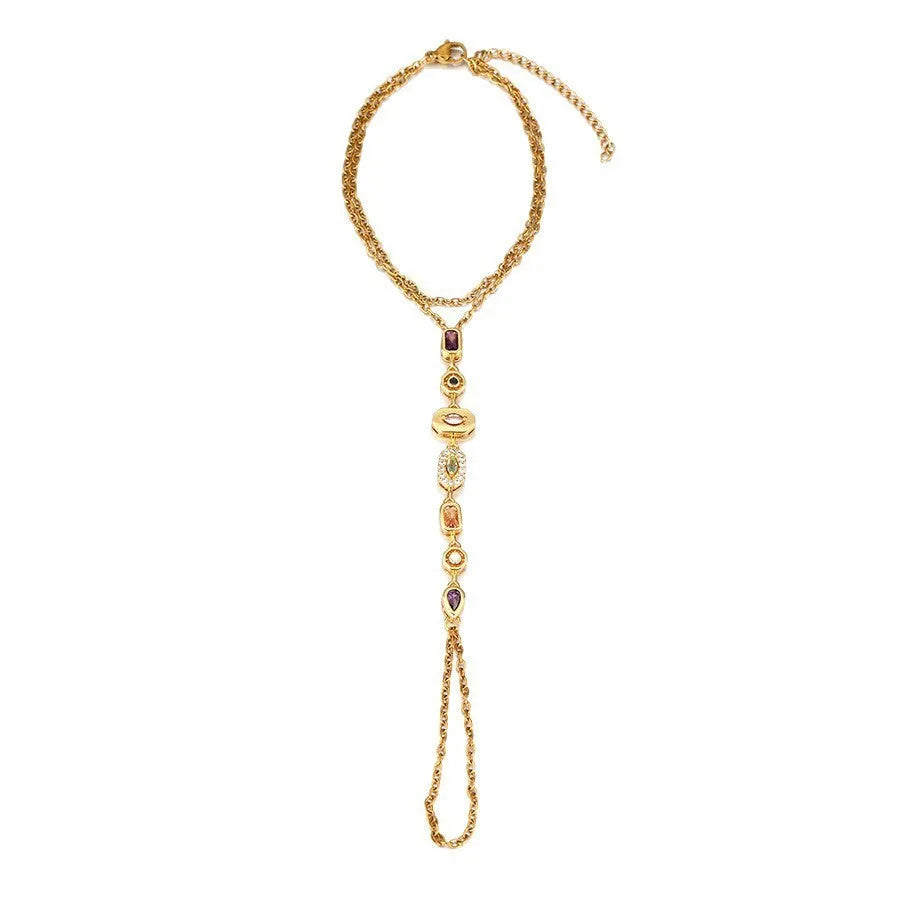 Titanium steel tassel rhinestone finger chain bracelet in drop shape, gold or silver colour options