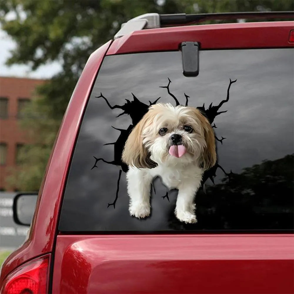 Torn-body dog design reflective window sticker in three size options on glass surface