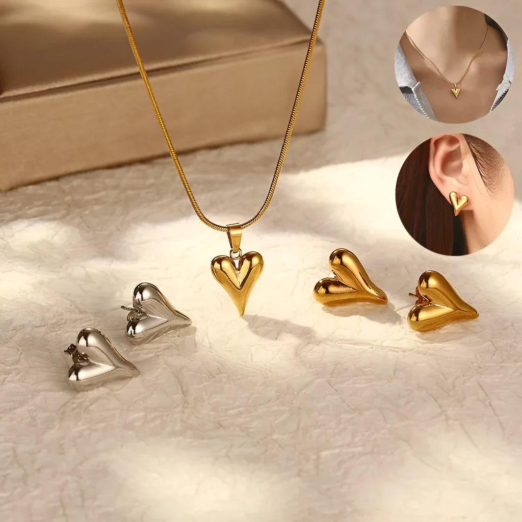 Heart-shaped stainless steel necklace with snake bone chain and matching earrings in gold or steel tone