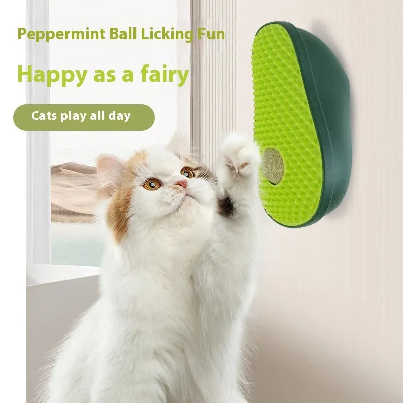 Green avocado-shaped cat scratching toy with textured posts on a white background