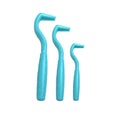 Set of three coloured plastic tick removal hooks for dogs on a white background.