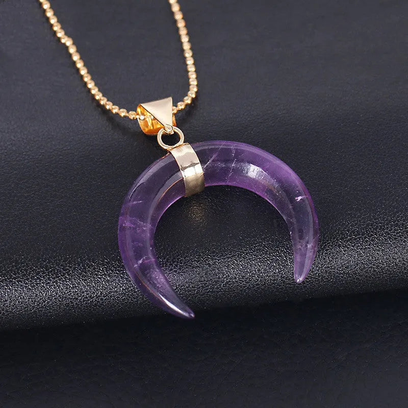 Crystal semi-precious stone moon pendant necklace on adjustable chain, showing natural stone details and copper fittings