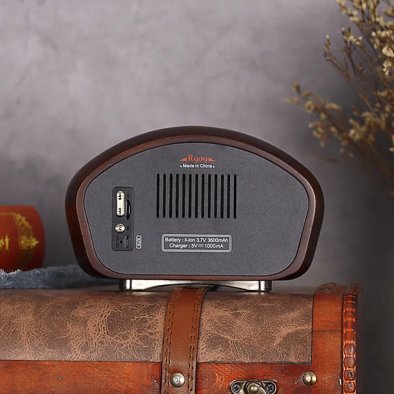 FMAM portable Bluetooth speaker with FM radio in Cherry or Walnut, 3600 mAh battery, USB interface.