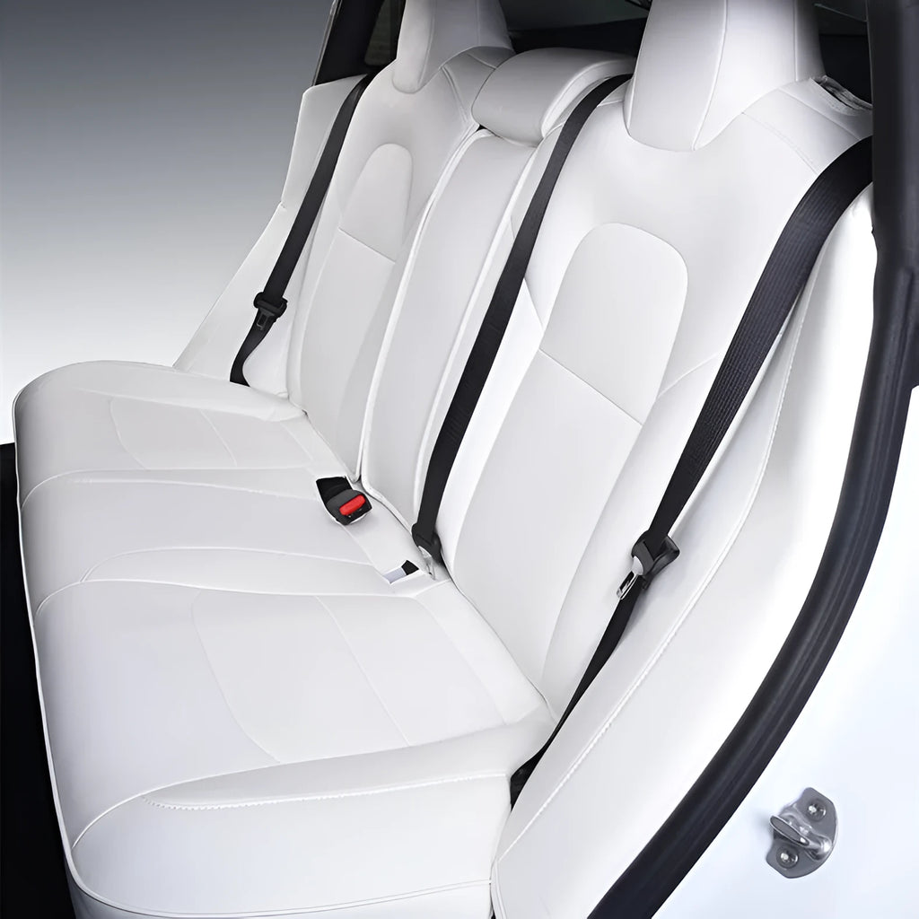 Black and white PVC car seat covers fitted on Tesla Model 3 and Y front and rear seats.