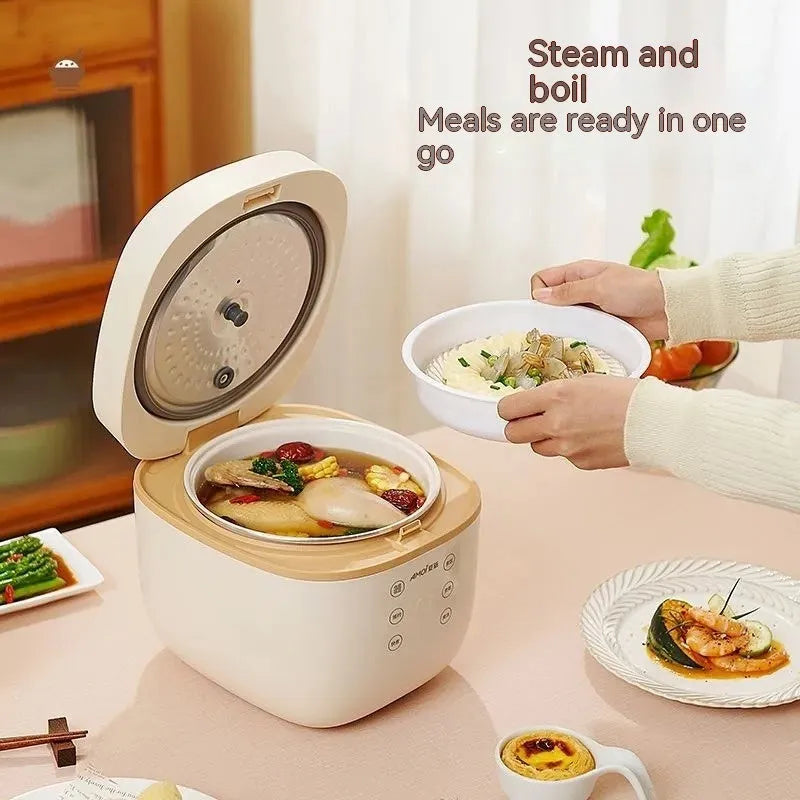 White and beige plastic multi-function 3-litre rice cooker with black inner pot and accessories.