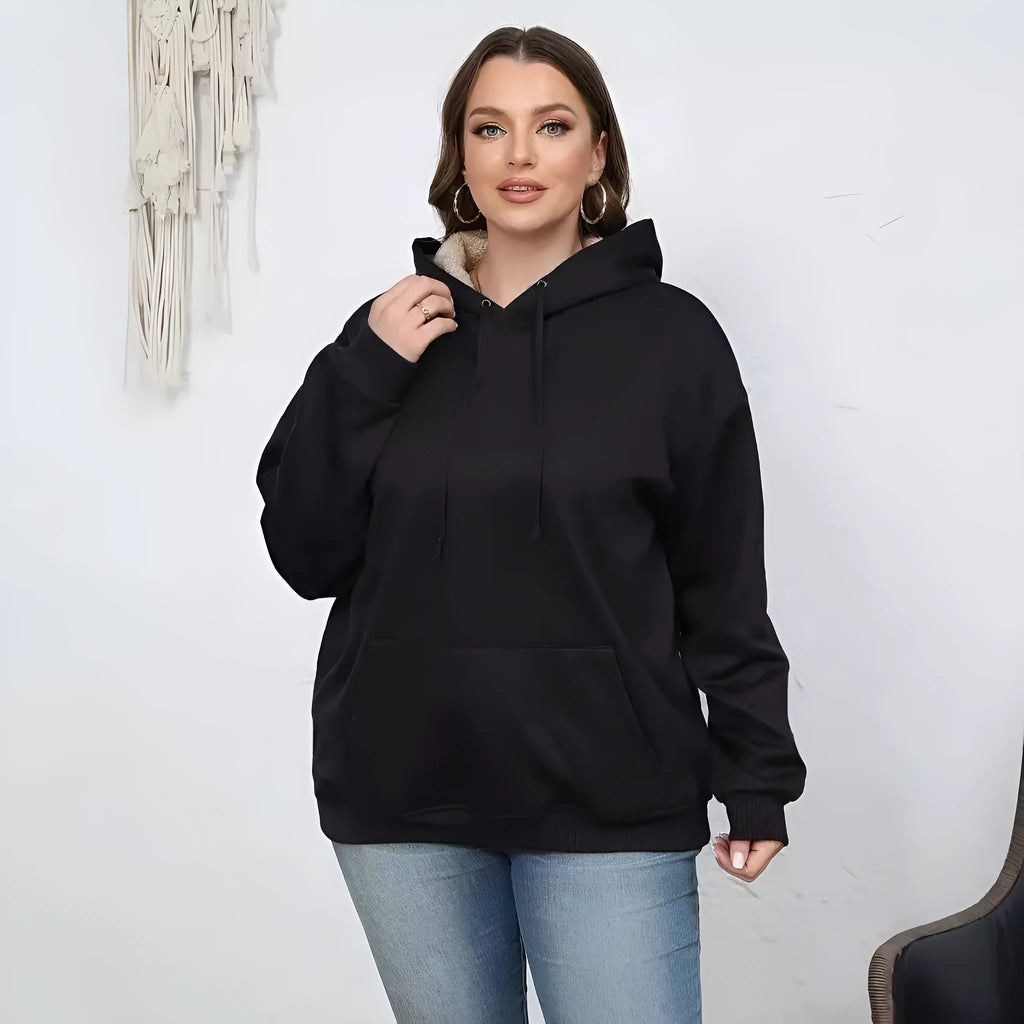 Women's black hooded sweater with a textured 3D pattern, loose fit, and front pockets.