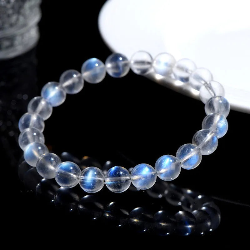 Natural cream body blue moonlight crystal bracelet with grinding treatment and unisex design