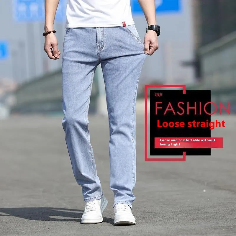 Men's straight leg jeans in smoky gray with low waist and zipper fly closure