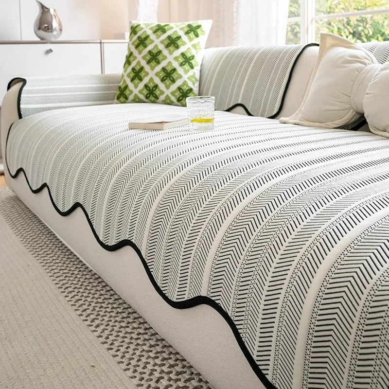 Special-shaped sofa cover in Ice Silk fabric with non-slip design, shown in Cloud Gray colour on a sofa