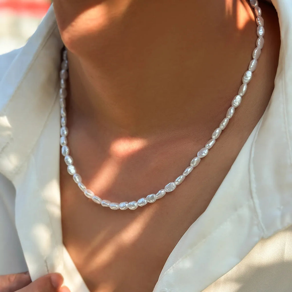 Men's white handmade U-shaped imitation pearl necklace with mother pearl shellfish pendant