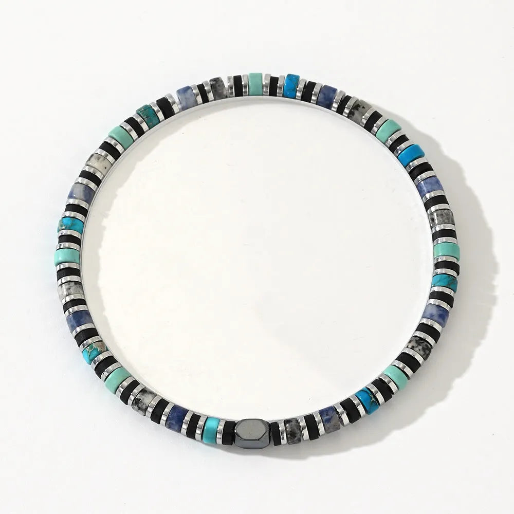 Hand-woven Bohemian bracelet with natural semi-precious stones in cylindrical geometric shape