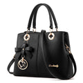 Retro fashion handbag in black with zipper opening, 30cm length, and 14cm adjustable strap on a model