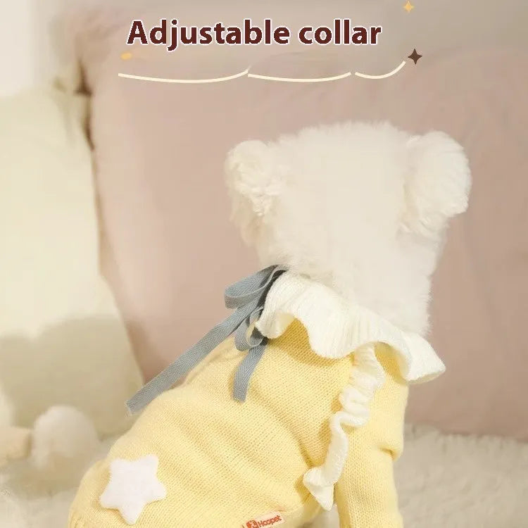 Yellow acrylic dog sweater on a small puppy, showing a casual knitted design.
