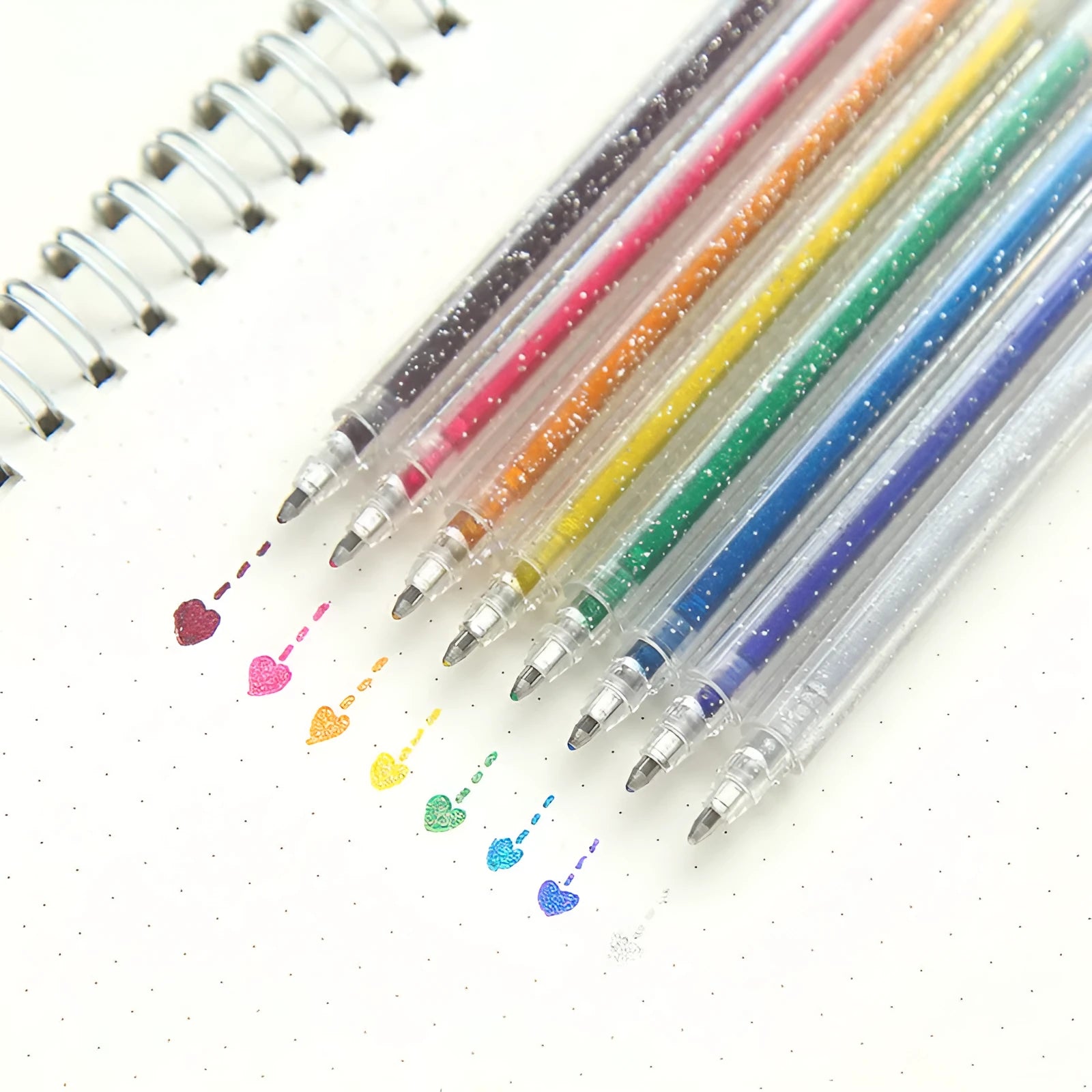 Eight colour changing flashing LED pens with plastic shells for office stationery use
