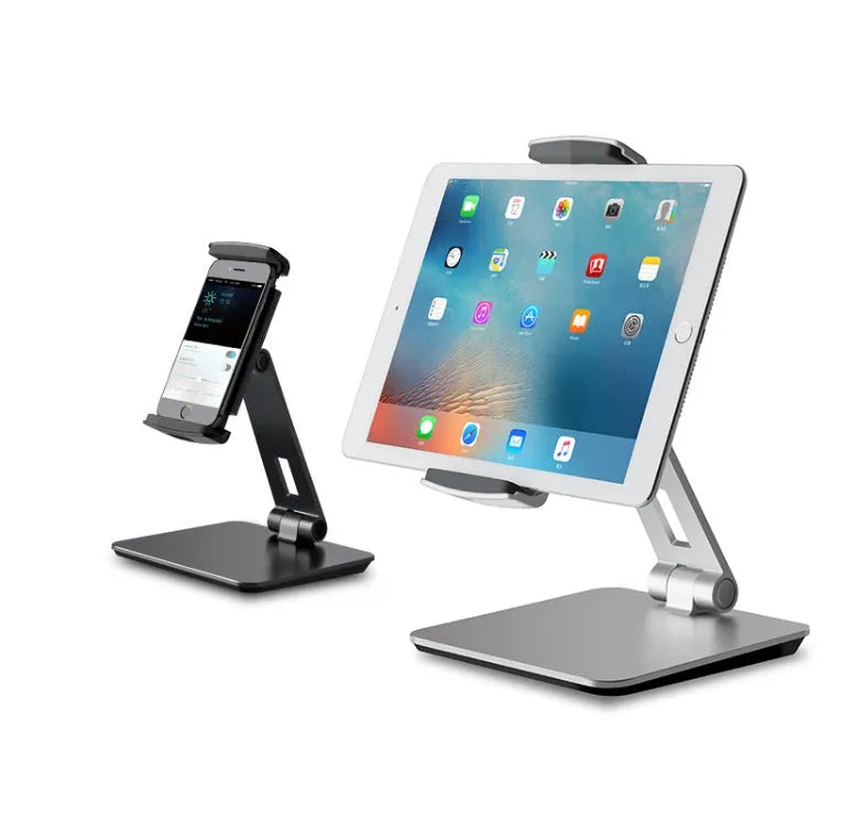 Silver foldable desktop holder supporting tablet with 360° rotation mechanism visible