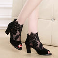 Lucyever women's gladiator sandals with square heel, lace upper, flower pattern, and zip closure in black colour