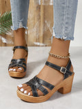 Plus size black Roman-style women's peep toe sandals with chunky heel and ankle-strap buckle.
