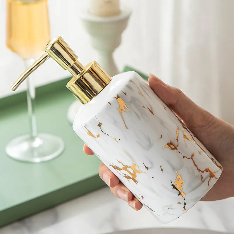 White ceramic bathroom wash kit set with two cups, a soap dish, and a latex bottle in a presentation box.