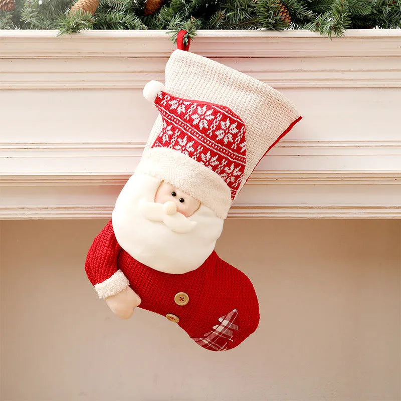 Large red white knitted Christmas stocking with Santa Claus design hanging above fireplace