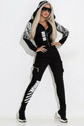 Women's black wings printing hooded street suit with zipper, long sleeves, and trousers in lightweight polyester fabric.